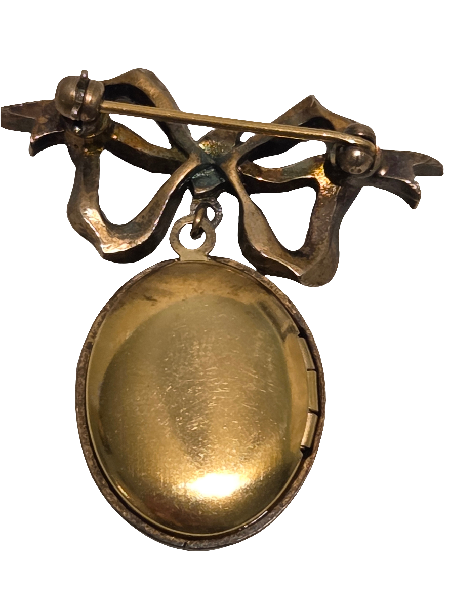 Period: Late Victorian Era (circa 1870s - 1890s) or Art Deco 1920s