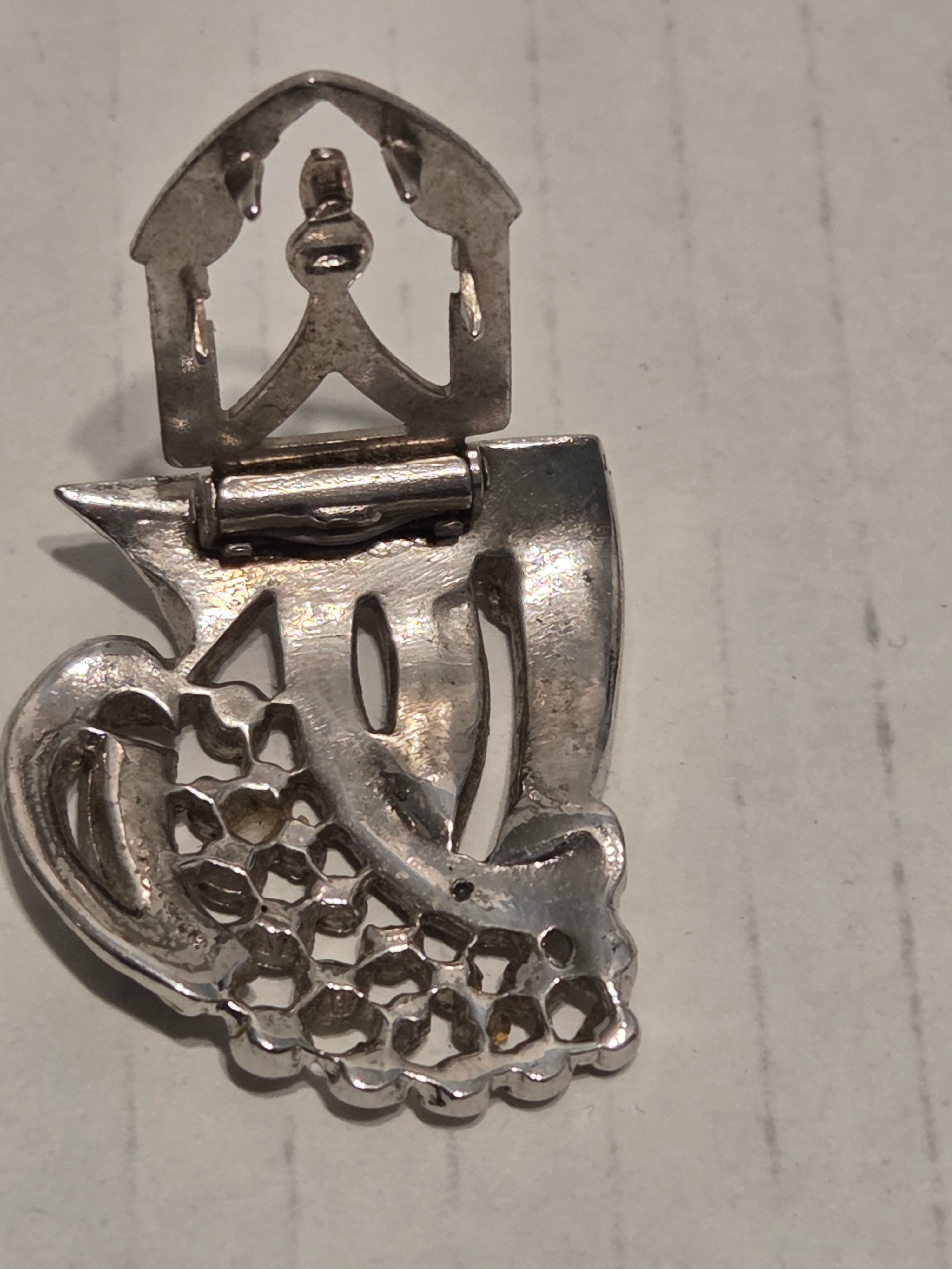 vintage clips from two distinct and important periods in jewelry history.