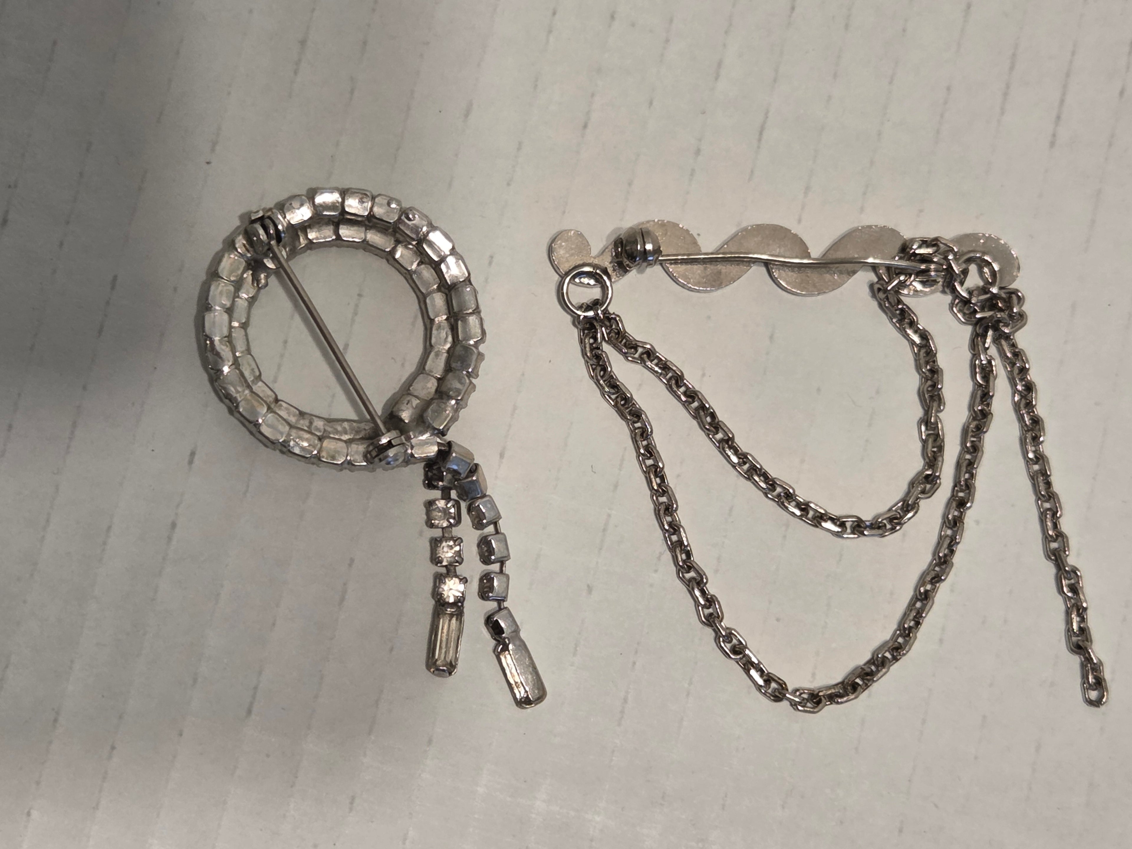 Rhinestone broaches very old