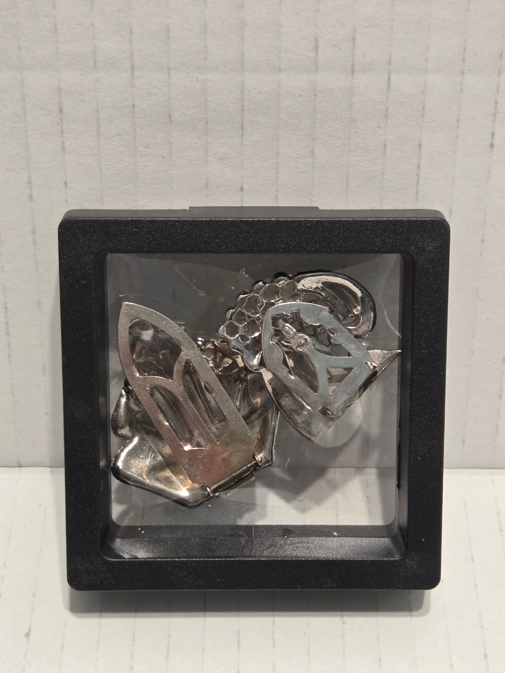 vintage clips from two distinct and important periods in jewelry history.