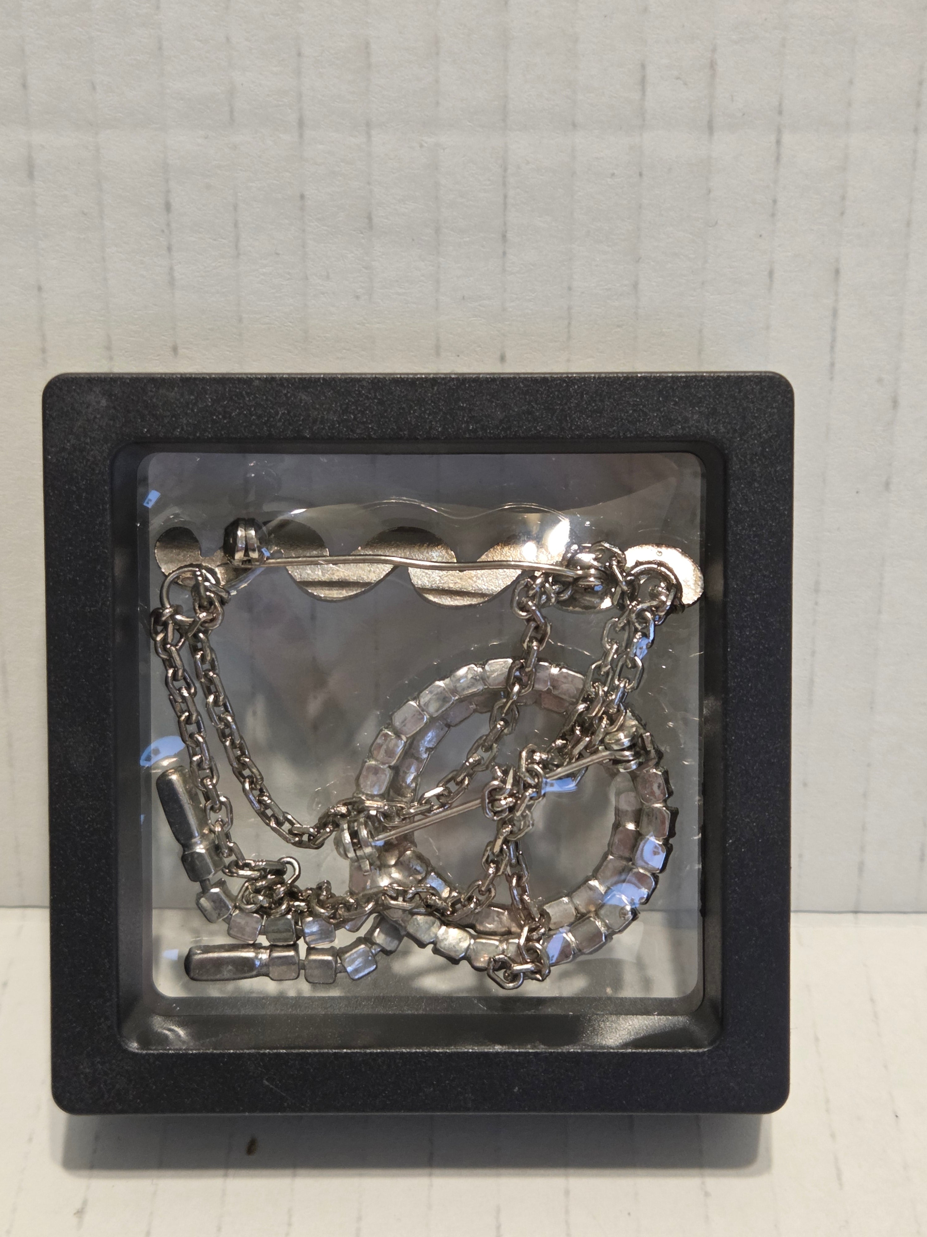 Rhinestone broaches very old
