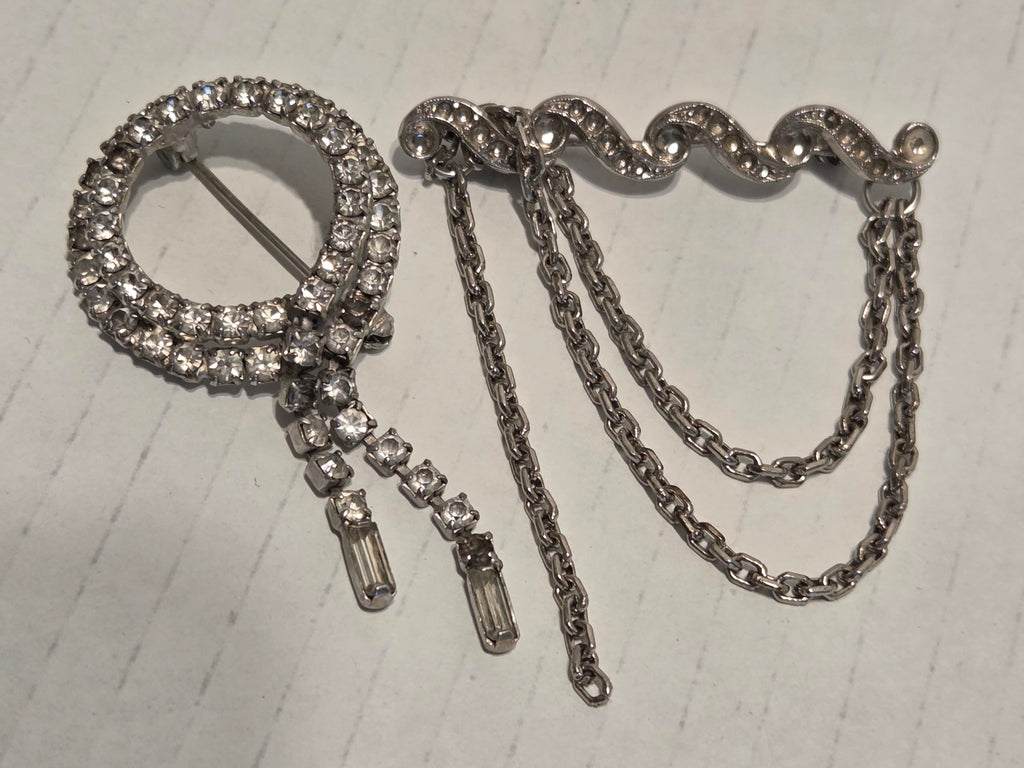 Rhinestone broaches very old