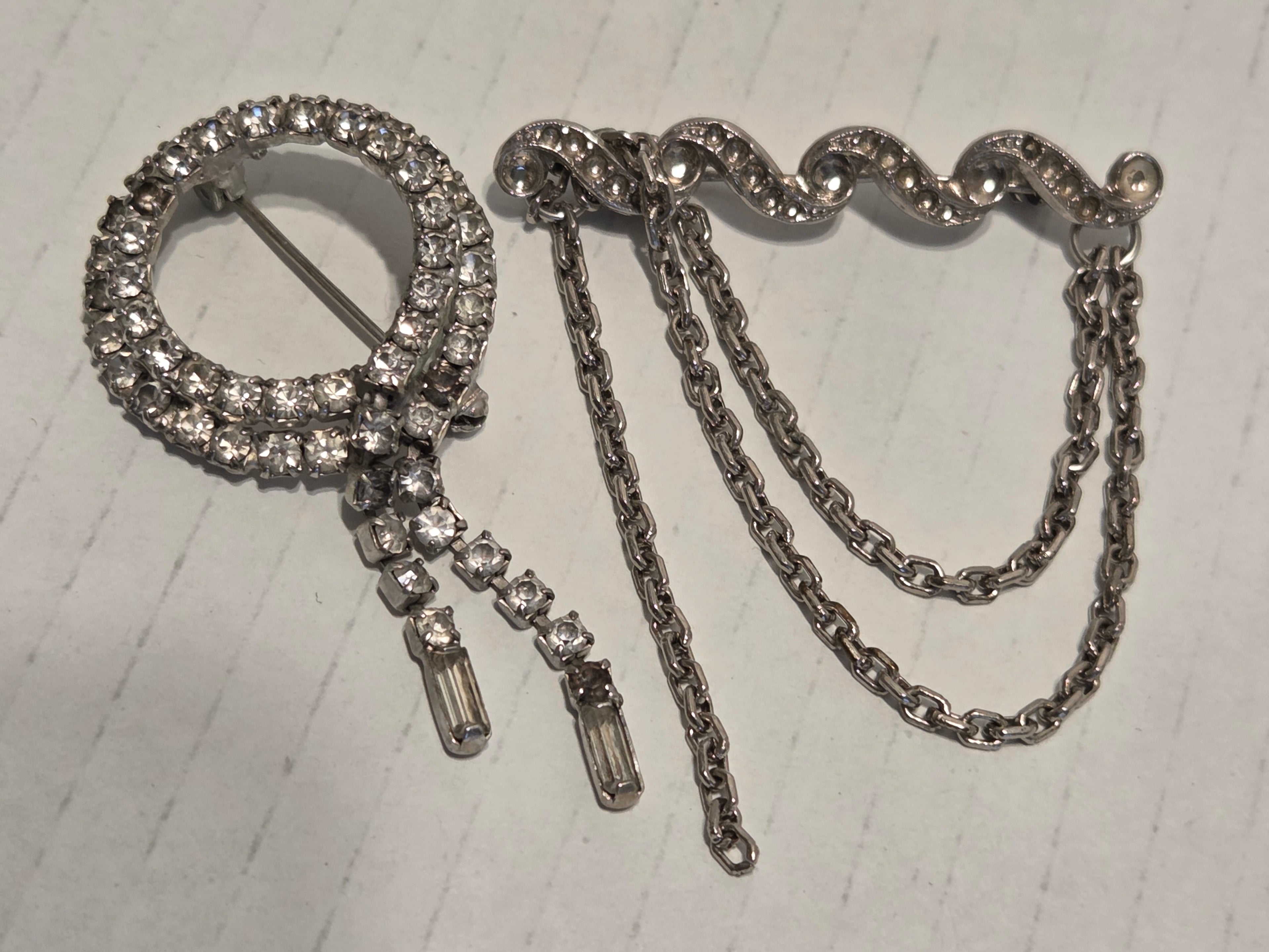 Rhinestone broaches very old