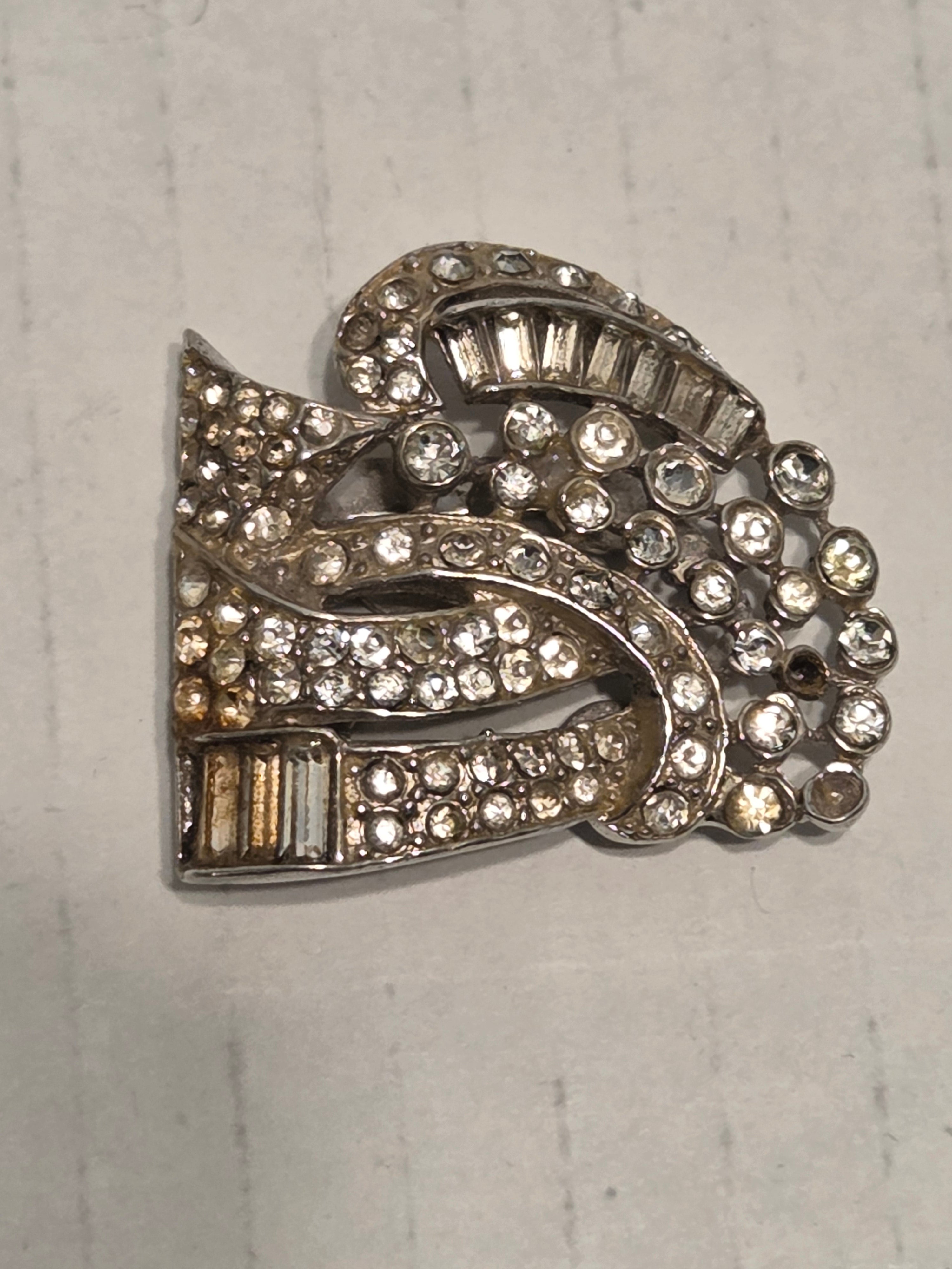 vintage clips from two distinct and important periods in jewelry history.