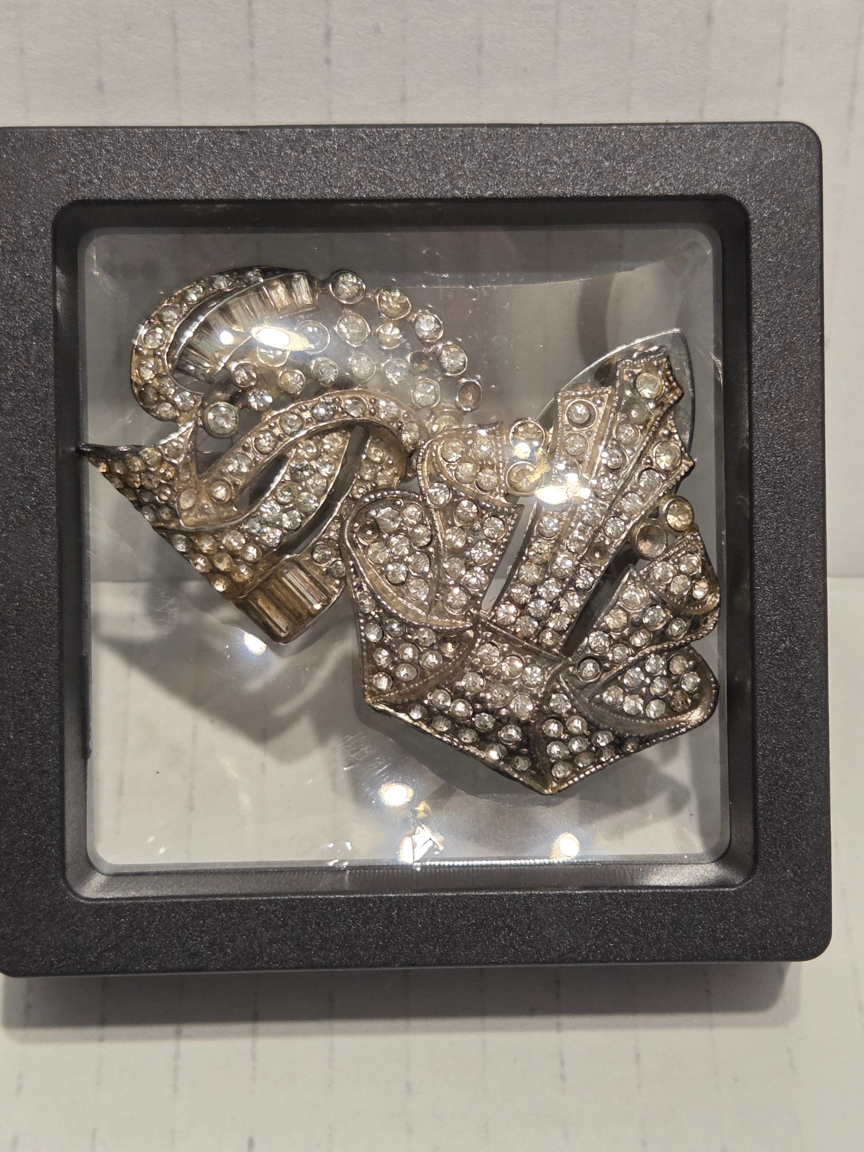 vintage clips from two distinct and important periods in jewelry history.